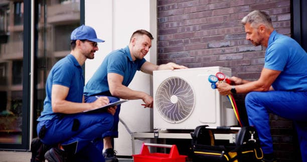 Licensed HVAC technician working on indoor AC unit in Upper Marlboro MD